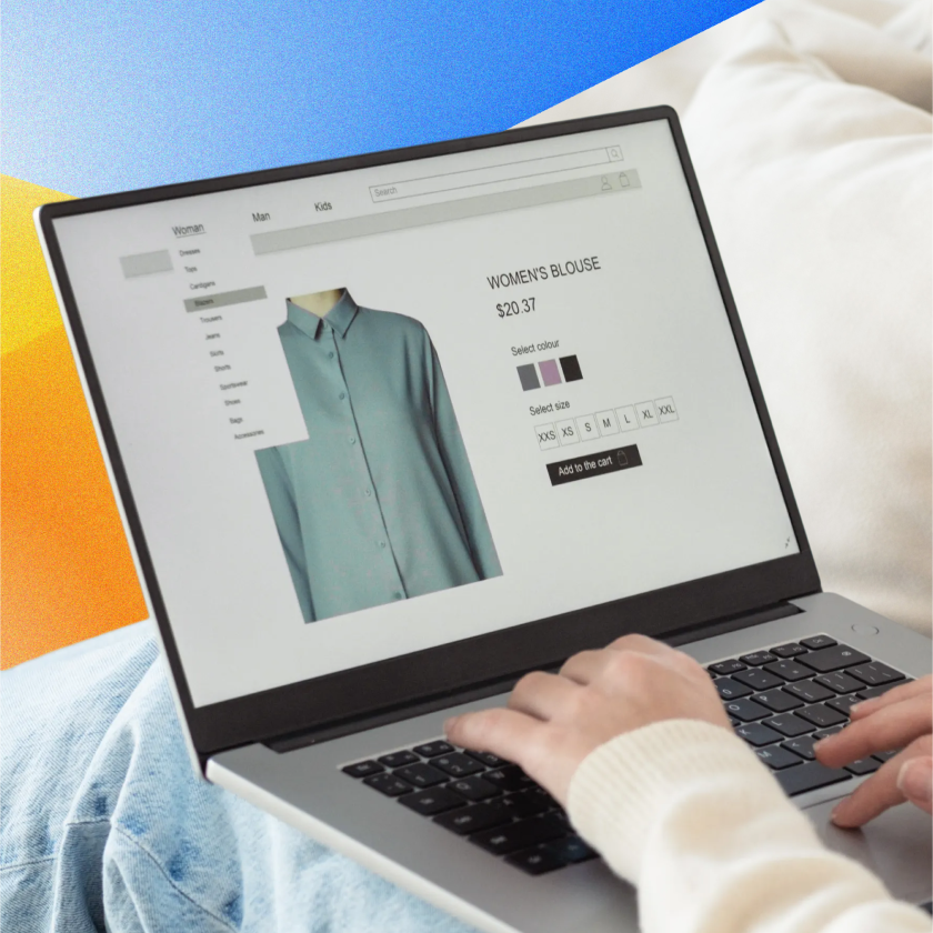 Laptop displaying an online clothing product page with size and color options.