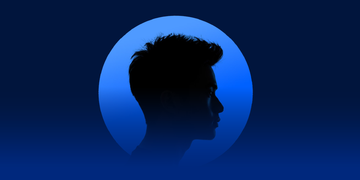 Dark blue shape of a person's head inside a circle on a lighter blue background
