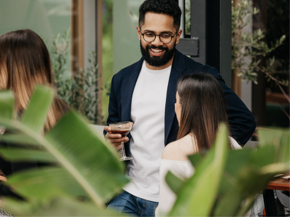 People talking while attending an event. 