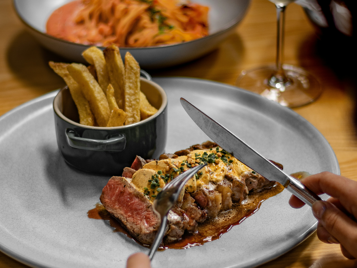 A plate of food at a fine dining establishment. 