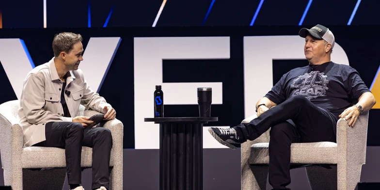 Ryan Nelsen, CMO of StackAdapt, and Gary LeVox, co-founder and lead singer of Rascal Flatts, discussing how brands can turn attention into lasting fandom during a featured session at Conversion 2026.
