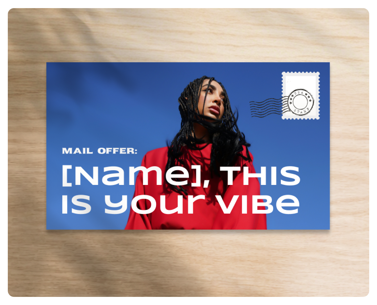Programmatic direct mail postcard example placed on a tabletop.
