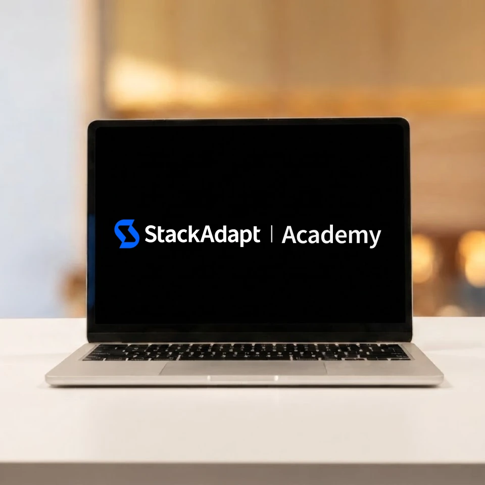 Laptop with StackAdapt Academy on the screen