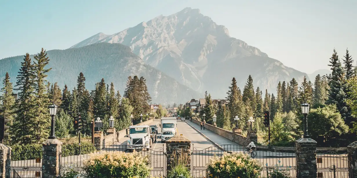 A view down Banff Avenue over the Bow River Bridge in Banff, Alberta