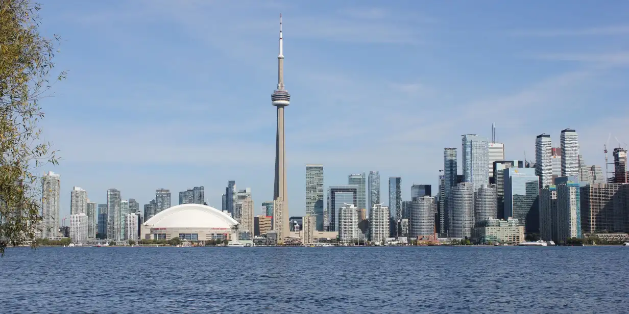 The Toronto skyline featuring the CN Tower and the domed Rogers Centre