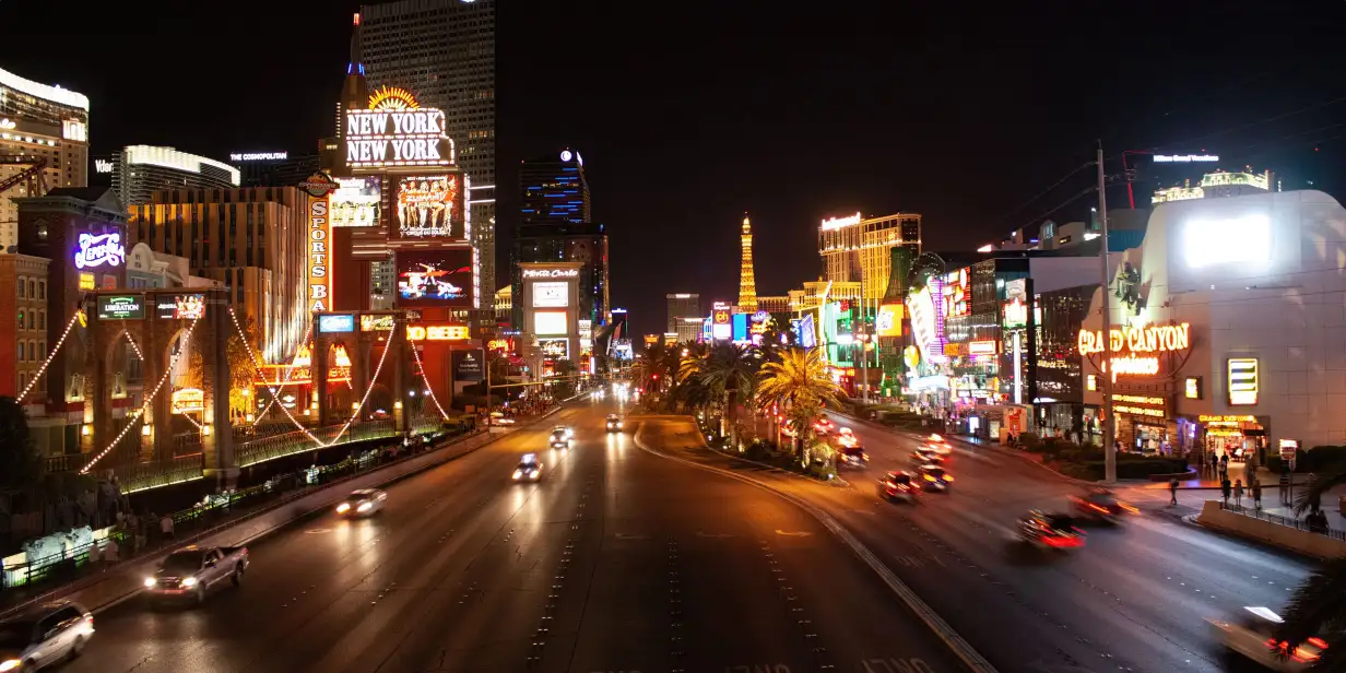 The Las Vegas Strip illuminated at night with vibrant neon signs